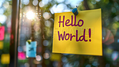 hello world, paper art and sticky note for invitation and welcome to community outdoor in nature. Message, text and greeting for earth day and environmental awareness outside with lens flare on glass