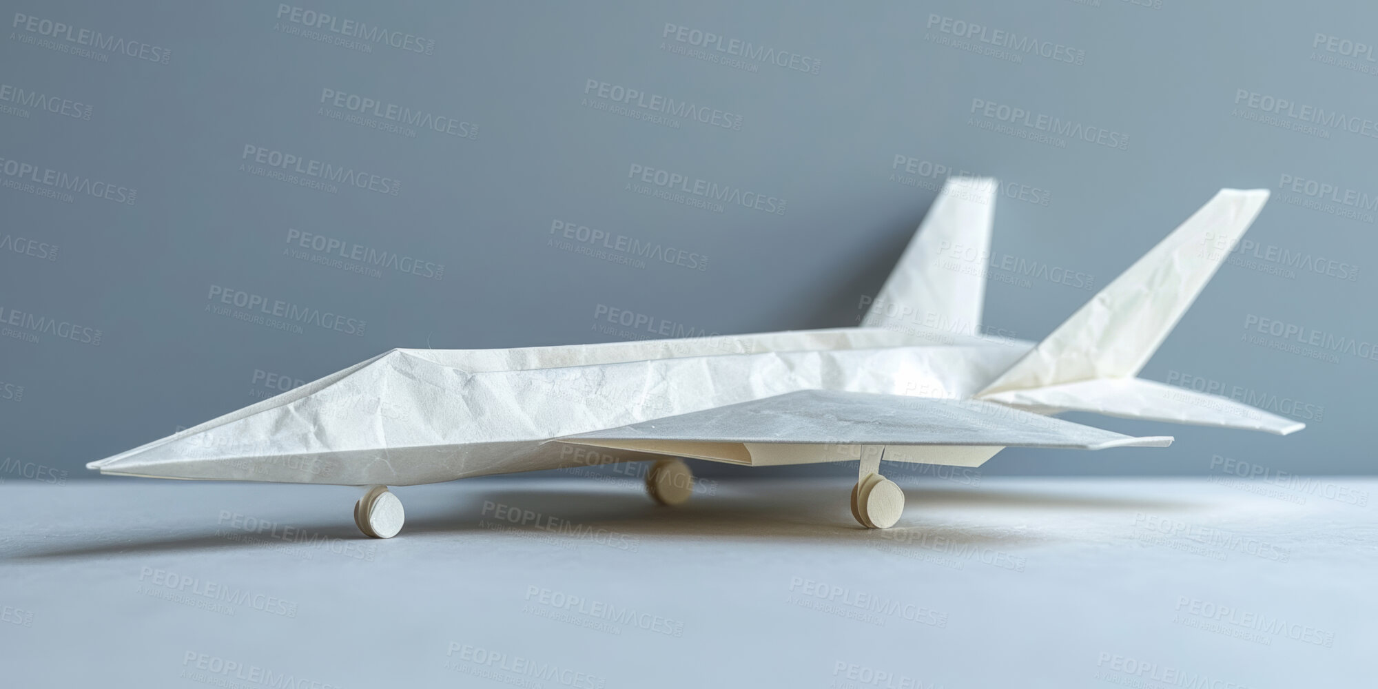 Buy stock photo Paper plane, toys and art in studio by background for flight, global transport and recycle waste for creativity. Airplane, commercial or private jet with creativity, origami or international services