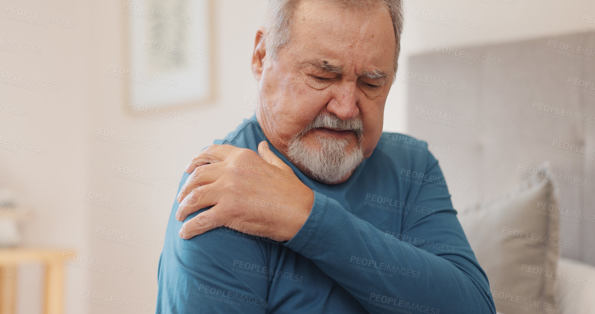 Buy stock photo Stress, sick and senior man with shoulder pain, accident or injury for bad posture in bedroom at house. Tired, illness and elderly male person in retirement with arthritis or fibromyalgia at home