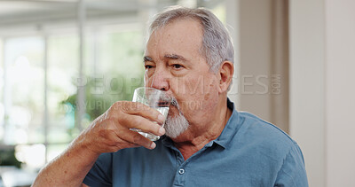 Senior man, drinking water and medicine in home for health with prescription, antibiotics and wellness. Elderly person, pharmaceutical drugs and glass in home for arthritis pain, supplements and pill