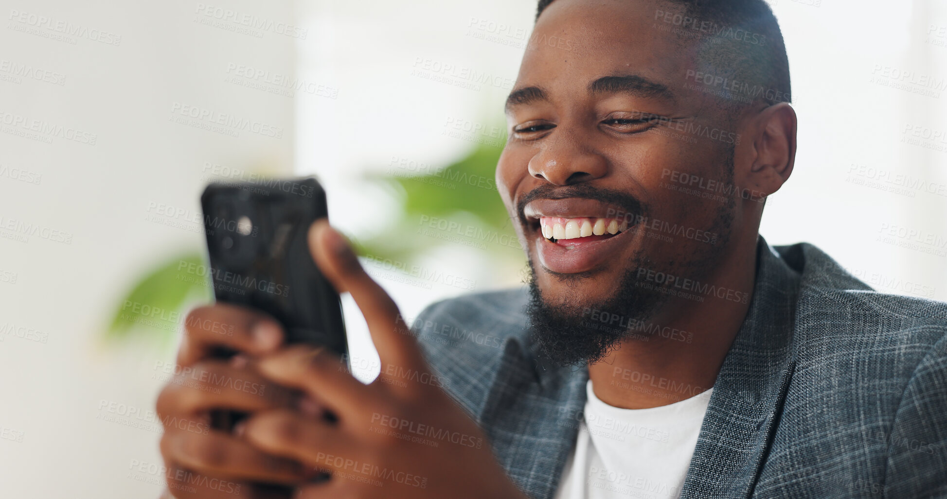 Buy stock photo Black man, happy and online on phone in home with digital gaming, internet streaming and entertainment. African person, smartphone and smile with social media scroll, communication or relax in lounge