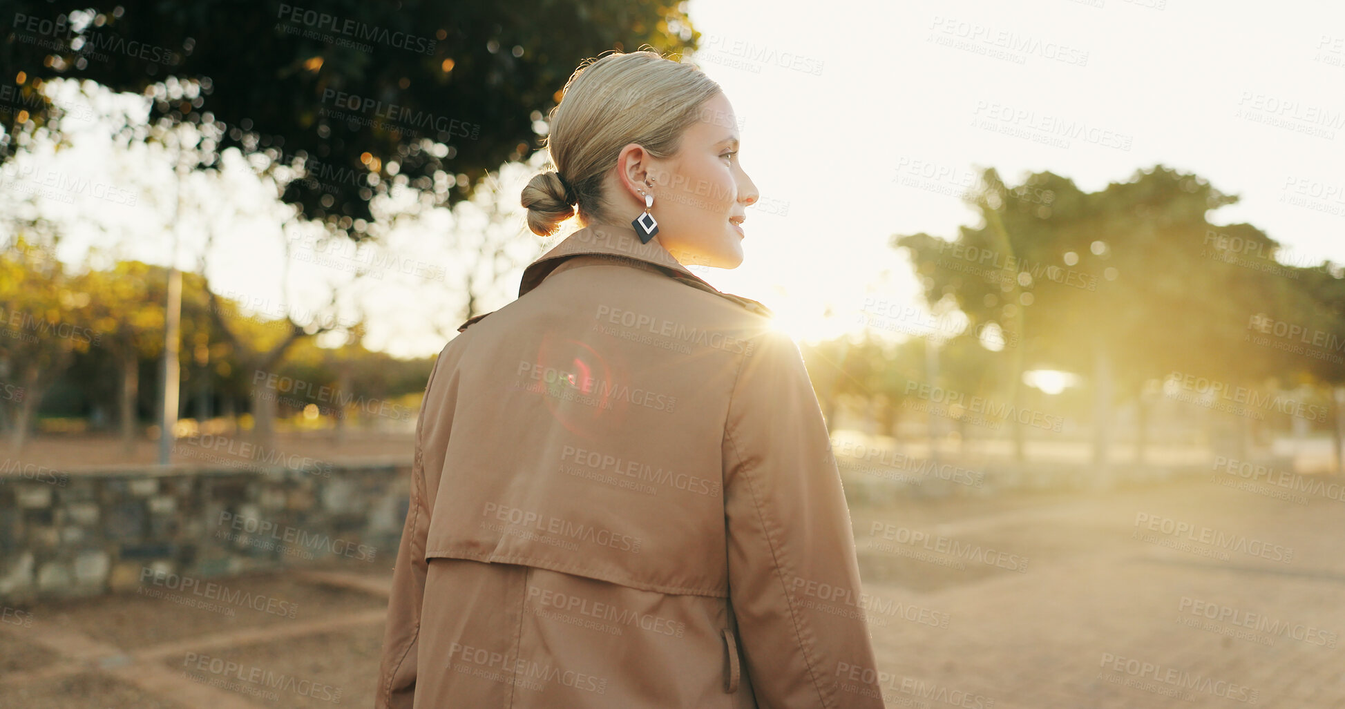 Buy stock photo Outdoor, walking and back view of business woman for afternoon travel, journey and commute from workplace. Saleswoman, trees and daily movement after work, corporate and career for occupation