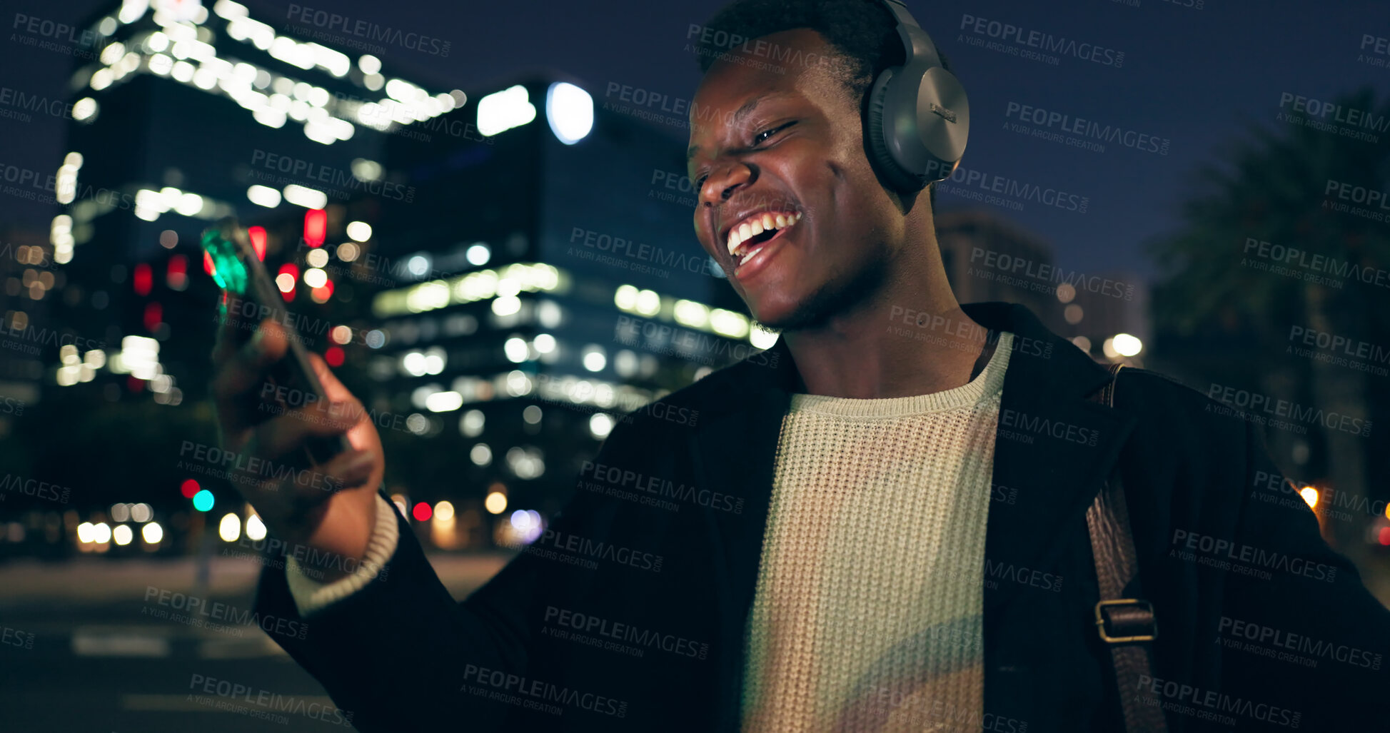 Buy stock photo Black man, headphones and music with city, night and audio livestream or subscription. African guy, podcast or radio for streaming, listening and urban track with technology and dance for techno