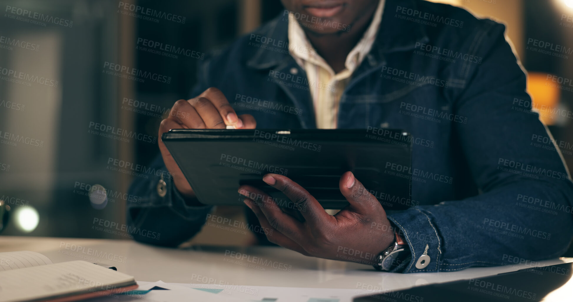 Buy stock photo Black man, tablet and working at night in office with business analytics for company with stylus. Trading, planning or finance with broker for overtime on internet or searching app with trader.