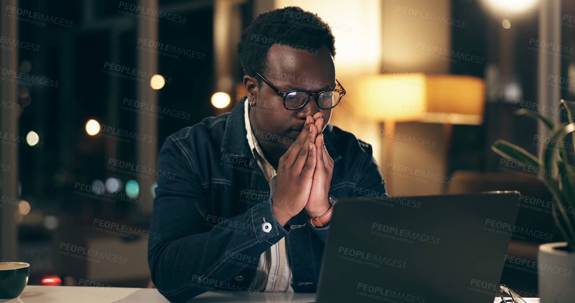 Buy stock photo Deadline, laptop and night with business black man in office for problem solving or review. Computer, doubt and frustration with confused design employee in creative workplace for evening overtime