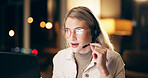 Technical support, headset and woman consultant in office at night for virtual assistant surveillance duty. Programming, late and female police cyber security agent working on computer for overtime.