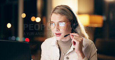 Technical support, headset and woman consultant in office at night for virtual assistant surveillance duty. Programming, late and female police cyber security agent working on computer for overtime.