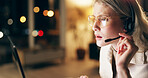 Virtual assistant, headset and woman agent in office at night for technical support surveillance duty. Programming, late and female police cyber security consultant working on computer for overtime.