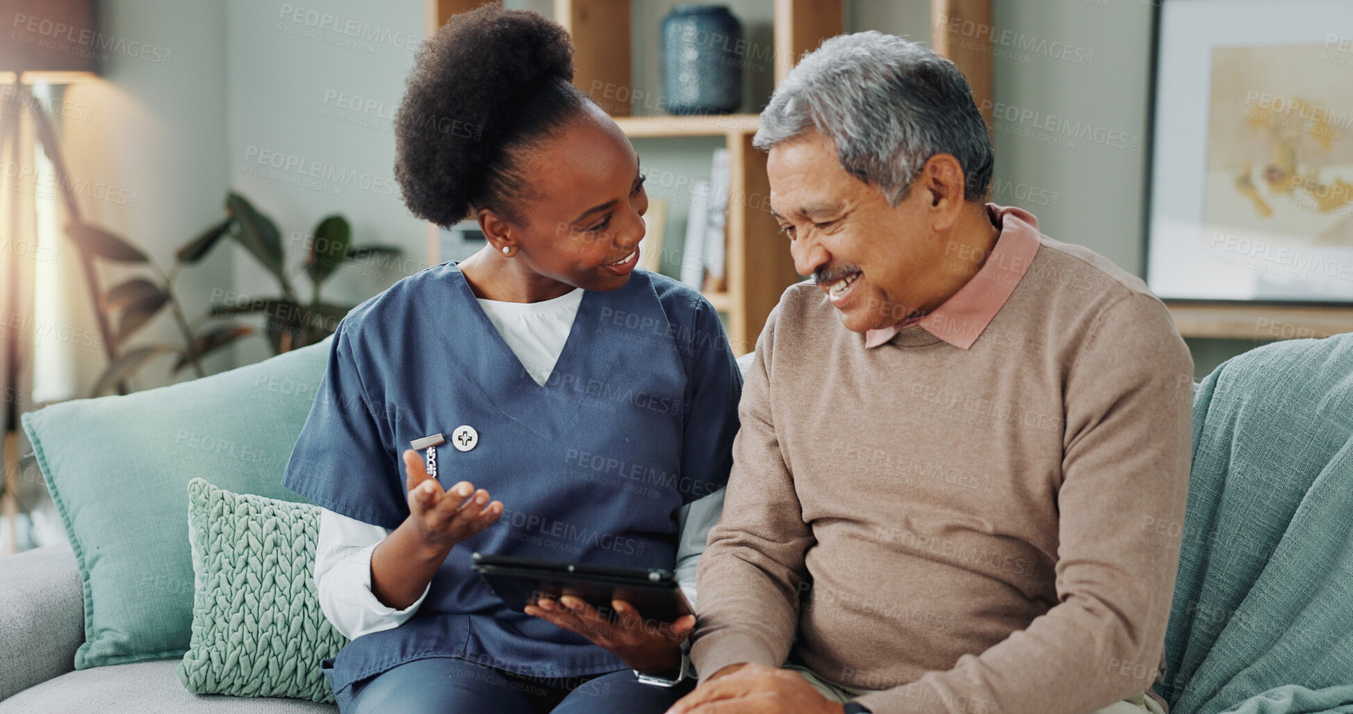 Buy stock photo Tablet, healthcare and nurse in home by senior man, internet and communication on wellness on sofa. African caregiver, elderly person and technology for learning or help and trust in chronic illness