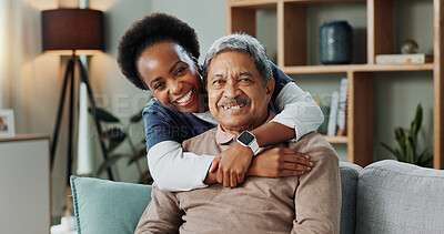 Living room, happy and nurse with hug for senior, old man and patient in home for retirement. Medical, woman and elderly male person with smile for healthcare, support and relax on sofa in house