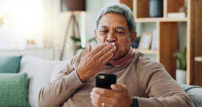 Phone, excited and senior man on sofa with smile, online chat and scroll on internet in home. Connection, networking and happy old person on couch with smartphone for mobile app, good news or relax