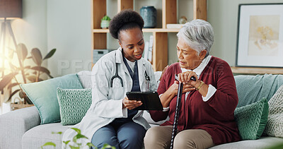 Elderly, woman and doctor with tablet for consultation with expert advice, explaining and healthcare support. Senior patient, nurse and discussion in nursing home, medical diagnosis and assessment