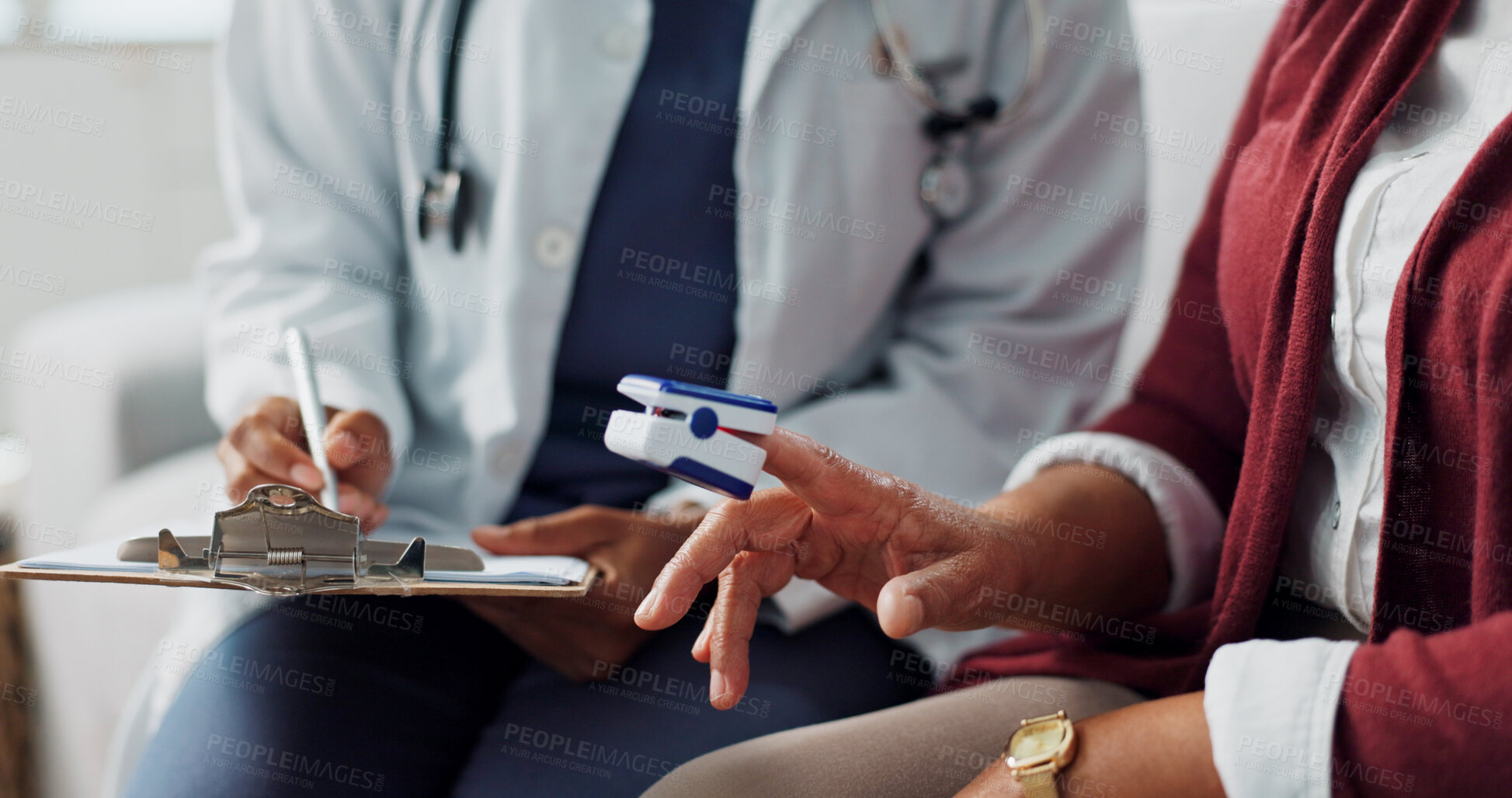 Buy stock photo Doctor, patient, hands in closeup of oximeter to measure, diagnose or assess blood oxygen levels. Woman, stethoscope or medical technology to support healthcare communication in gp appointment