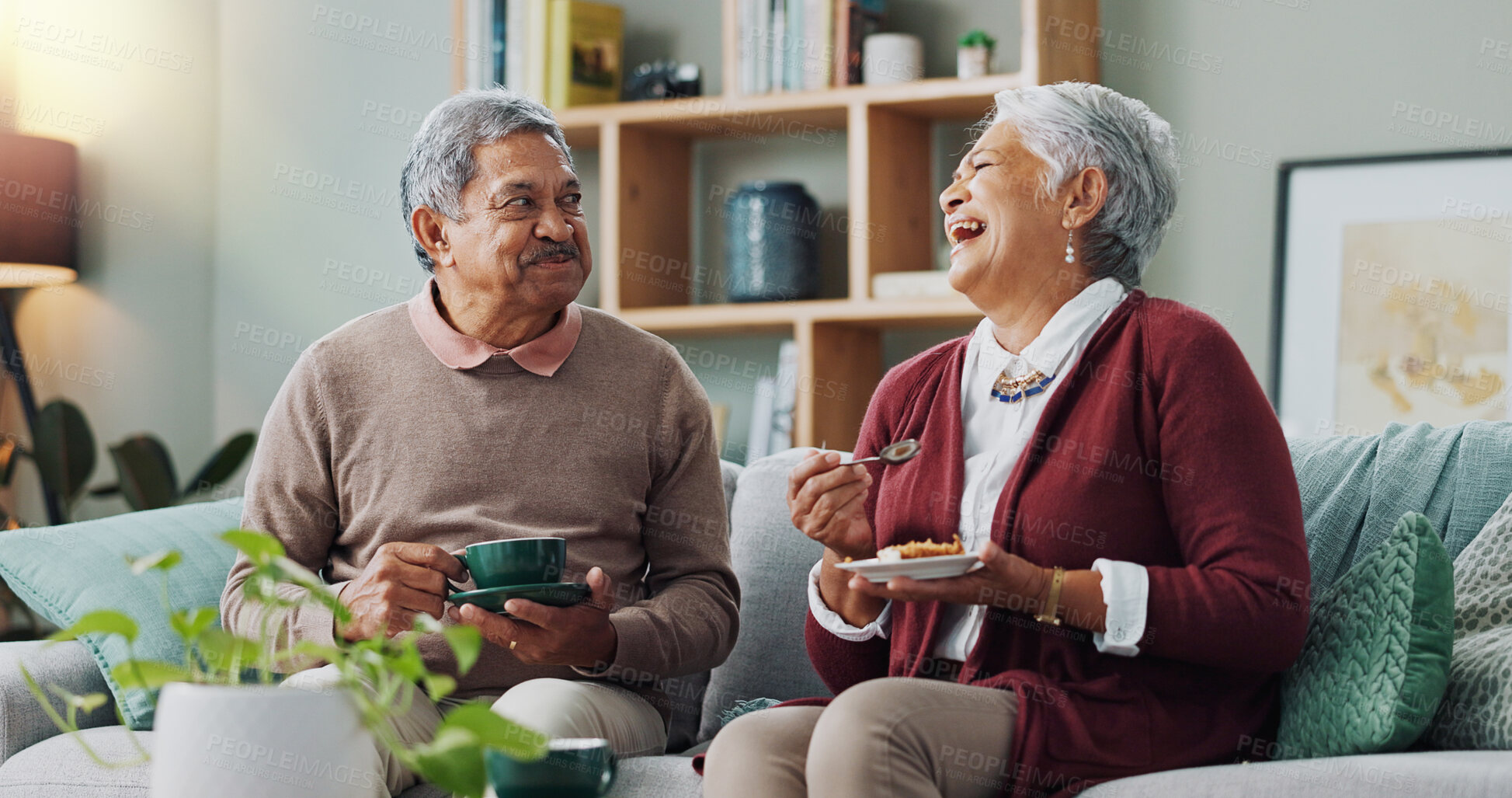 Buy stock photo Senior couple, happy and coffee on sofa in house, home and living room for retirement. People, elderly partners and family drinking tea, cake and food for laugh or relax on couch for love and bonding