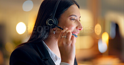 Woman, telemarketing and consulting at night in office for customer service, CRM advisory and funny communication. Face, agent and laugh in call center for telecom support, FAQ contact and questions