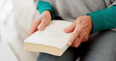 Closeup, hands and senior woman with a bible, faith and trust with religion, peace and wellness. Zoom, female person or elderly lady with scripture, holy book and worship with gratitude and guidance