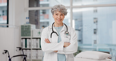 Portrait, woman and doctor with arms crossed, confidence and happiness with healthcare consultant, hospital and career. Medical professional, female person or happy lady with success, proud and smile