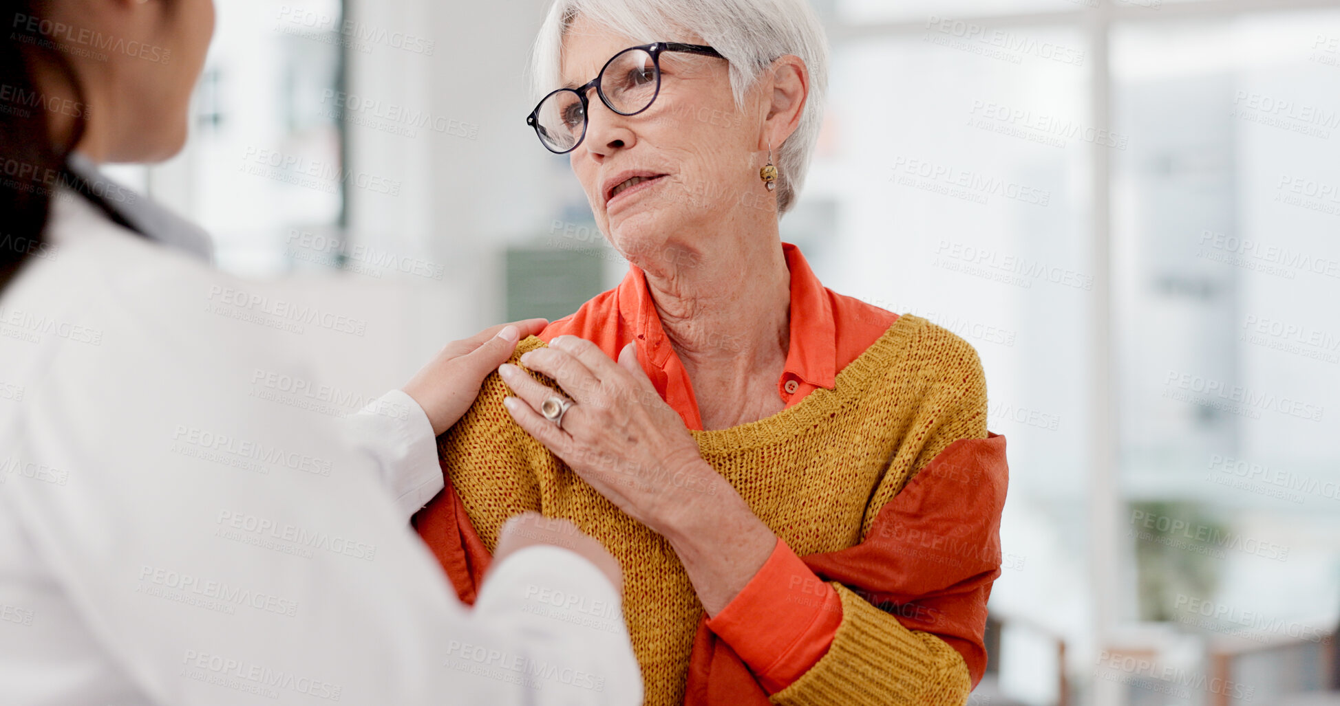 Buy stock photo Medical, shoulder pain and a senior woman with her doctor in the hospital, talking during a consultation. Healthcare, insurance or anatomy and a woman patient in a clinic with a medicine professional