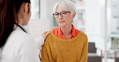 Healthcare, shoulder pain and a senior woman with her doctor in the hospital, talking during a consultation. Medical, insurance or anatomy and a woman patient in a clinic with a medicine professional
