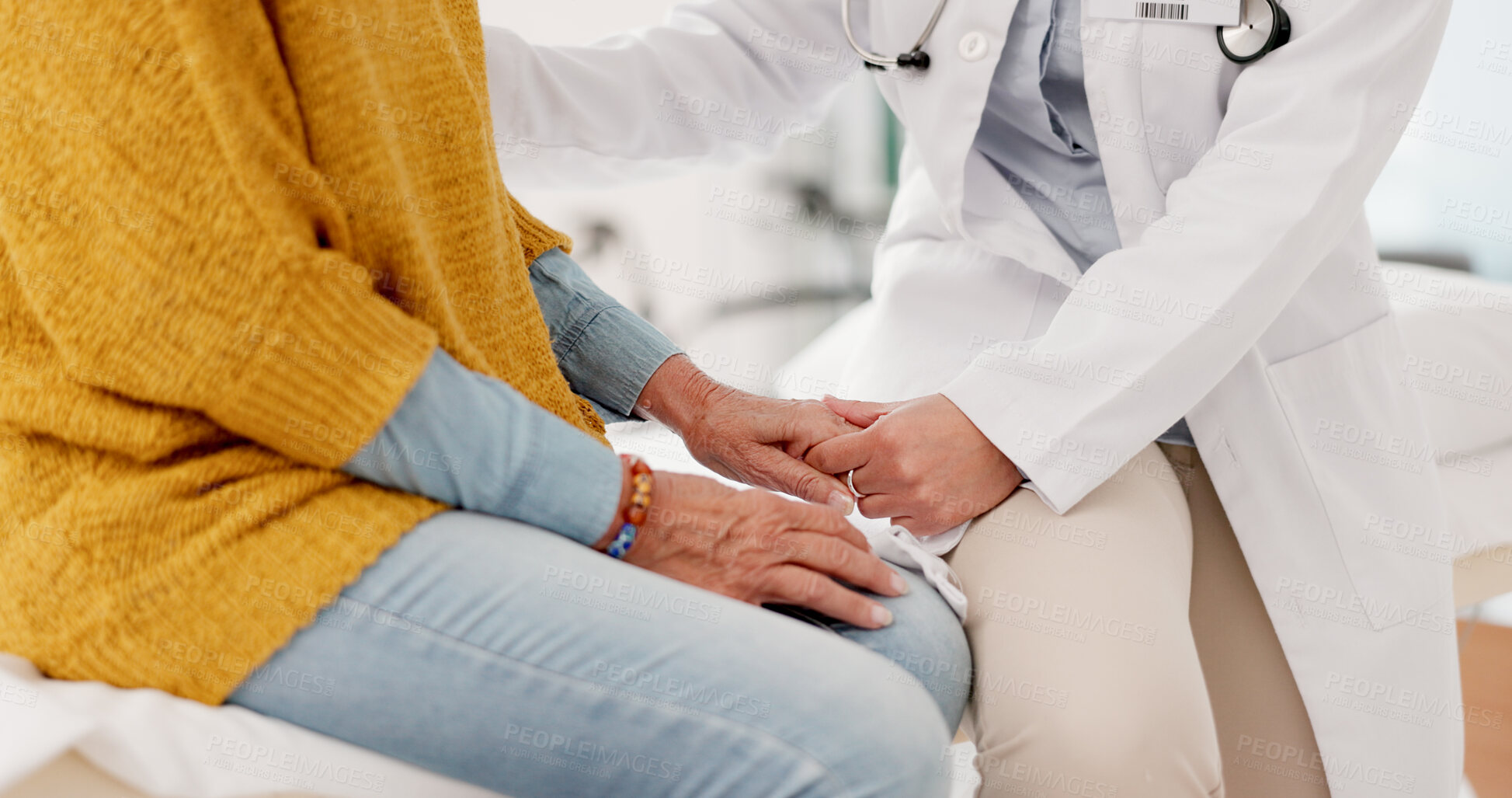 Buy stock photo Holding hands, closeup or doctor with patient in consultation for healthcare advice or checkup at hospital. Support, cancer therapy or medical worker talking to person in appointment for medicare