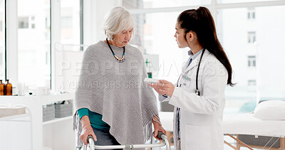 Walker, medicine or doctor with a senior patient in consultation for healthcare advice at hospital. Prescription, pills or medical worker talking to old woman with a disability for rehabilitation