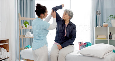 Buy stock photo Physiotherapy, senior woman with dumbbell and nurse in clinic for rehabilitation, fitness and support in healthcare exercise. Physical therapy, help and training with a physiotherapist in hospital