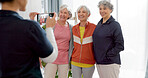Senior friends, phone and picture in home after exercise, workout or fitness. Elderly women, group and photography of happy people together after training for healthy body, wellness and retirement
