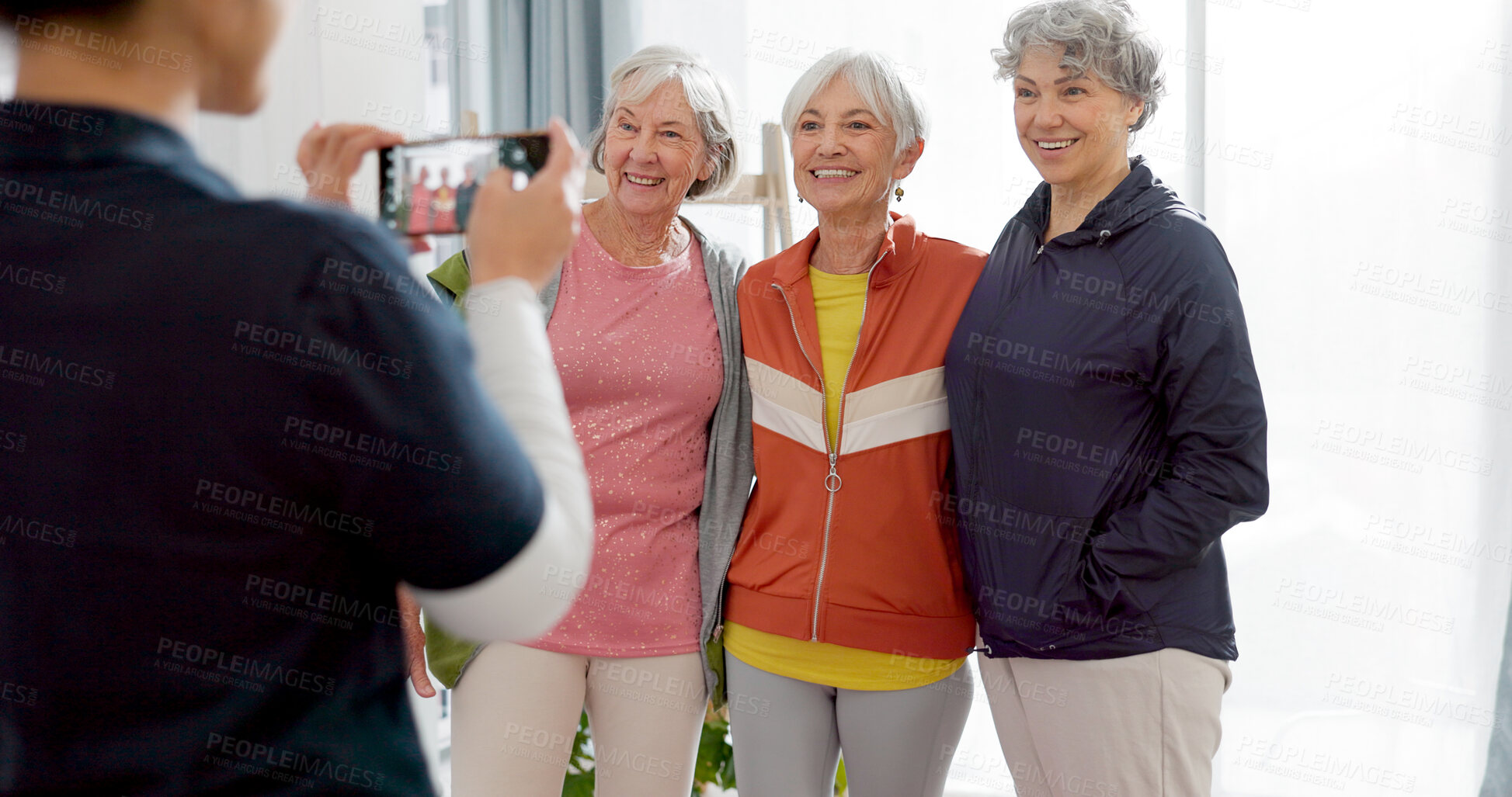 Buy stock photo Senior friends, phone and picture in home after exercise, workout or fitness. Elderly women, group and photography of happy people together after training for healthy body, wellness and retirement