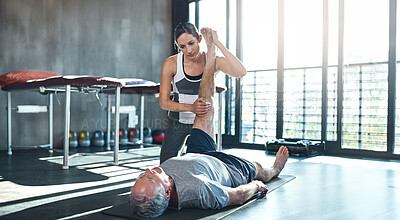 Buy stock photo Physiotherapist, senior man and stretching with exercise, healing and recovery with injury. People, physical therapy and mature client in gym, wellness or healthy person with fitness, workout routine