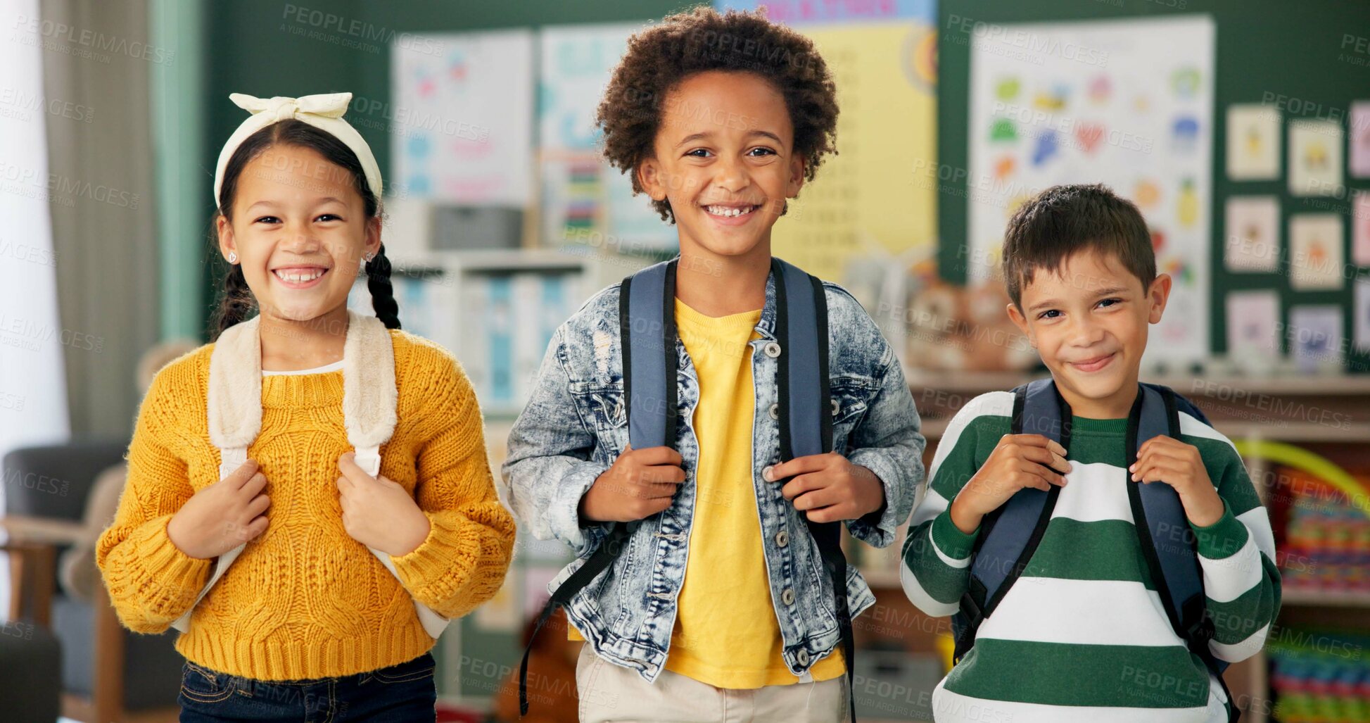 Buy stock photo Children, face and smile as friends in classroom with backpack fr back to school, excited or education. Boys, girl and portrait at academy campus or lesson learning or knowledge, diversity or student