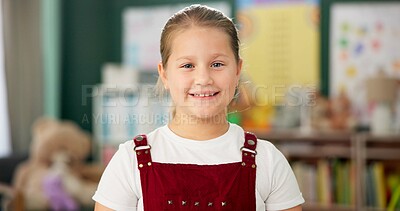 Smile, face and child in school for education, learning and ready for morning kindergarten. Happy, classroom and portrait of girl or student with knowledge, studying and pride for academic lesson