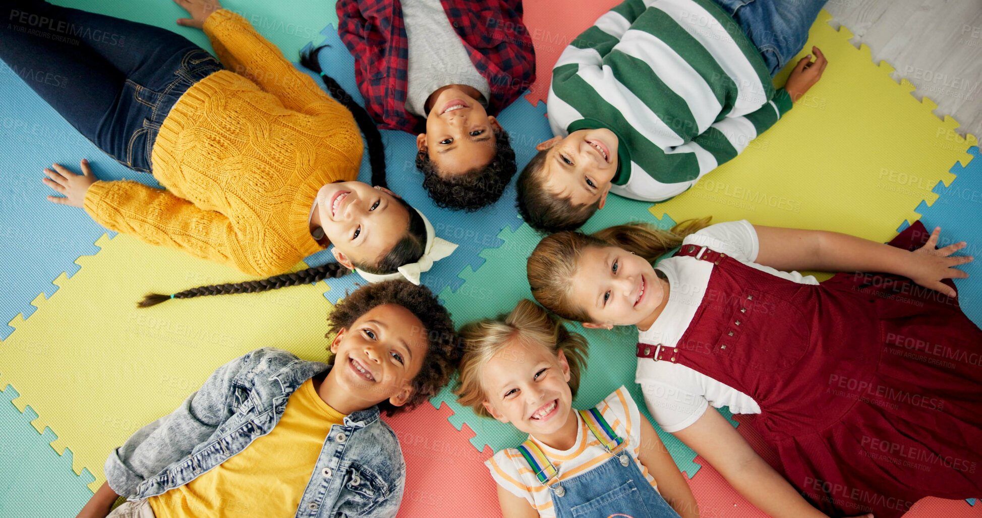 Buy stock photo Children, relax and circle on mat in school with funny faces top view for relax, fun and classroom. Group, kids and happy on floor for education, learning and knowledge with game for bonding