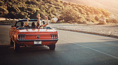 Buy stock photo Back view, freedom and friends in car for road trip by sunset for countryside vacation or holiday. Adventure, travel and people in convertible for driving to destination on weekend trip in Ireland.