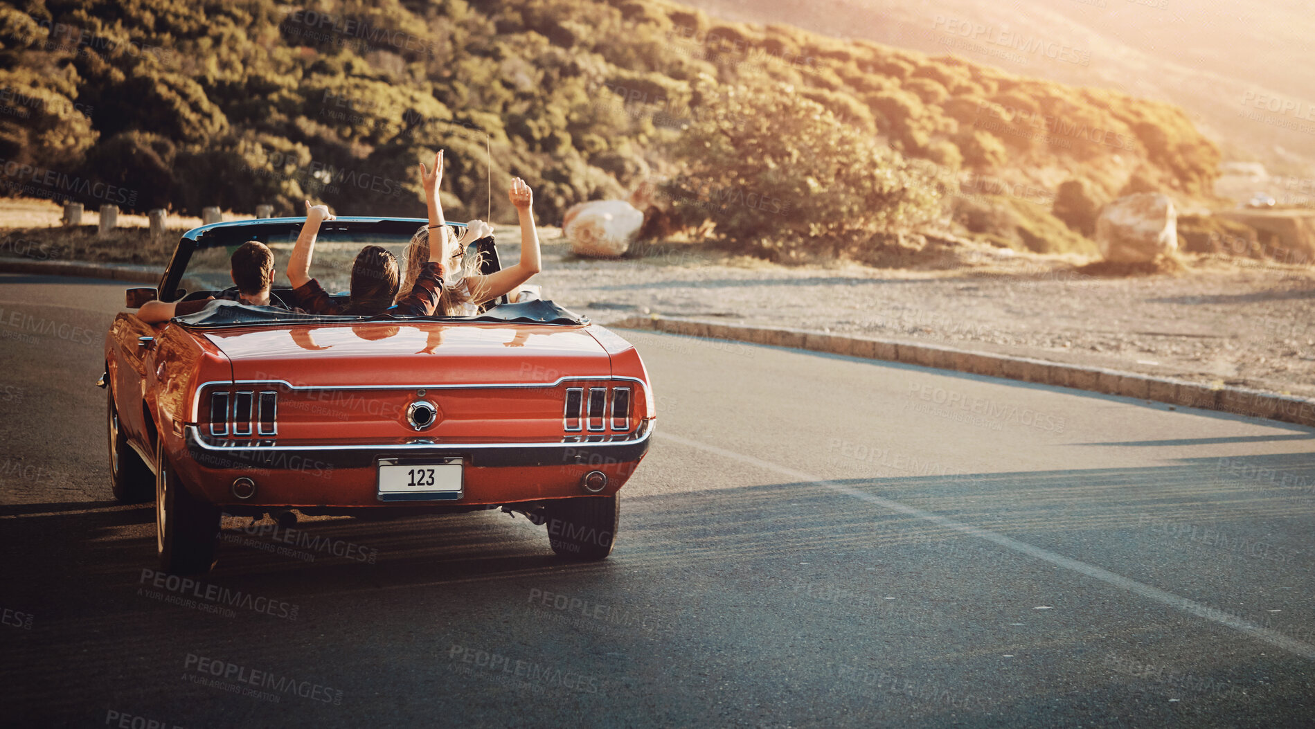 Buy stock photo Back view, freedom and friends in car for road trip by sunset for countryside vacation or holiday. Adventure, travel and people in convertible for driving to destination on weekend trip in Ireland.