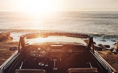 Buy stock photo Convertible, car and beach for view of sunset with road trip, adventure and sightseeing with mockup space. Empty vehicle, vintage ride or travel on coast at seaside for ocean sunrise, sea or scenery