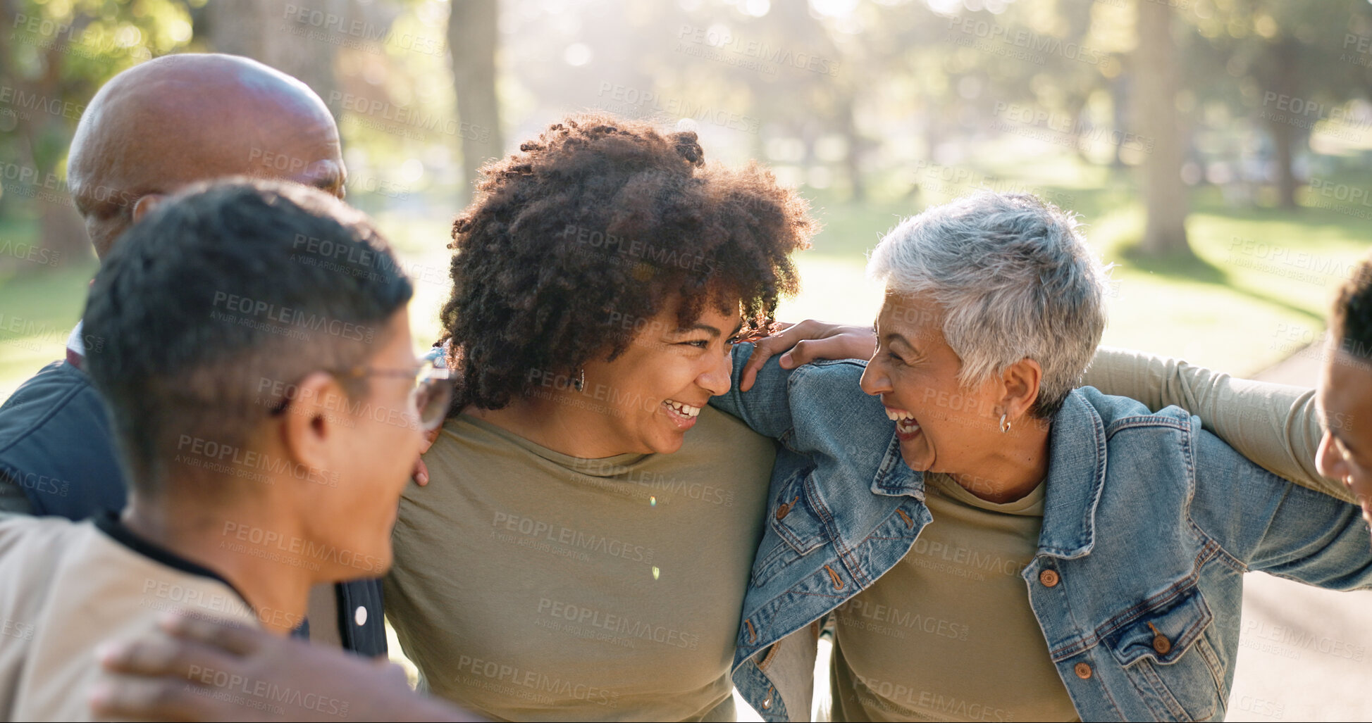 Buy stock photo Happy, huddle and group of people outdoor with collaboration, teamwork and solidarity for charity work. Hug, smile and ngo in park with cooperation, volunteer and community service for support