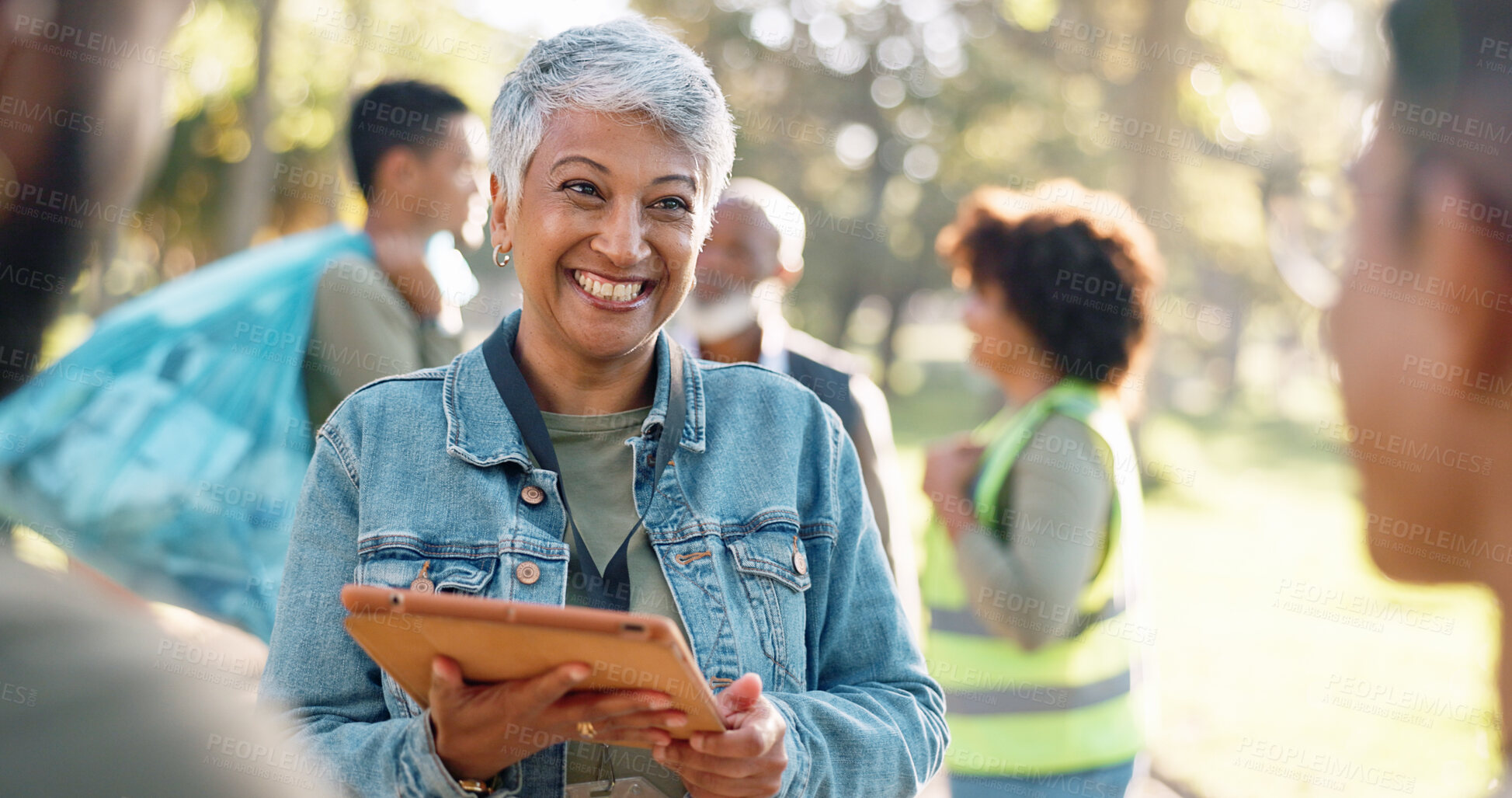 Buy stock photo Park, woman and smile planning with tablet for volunteers, community project or nature sustainability. Humanitarian, recycling or senior leader in charity service or NGO for pollution cleanup