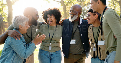 Buy stock photo Huddle, happy and volunteer group outdoor with collaboration, teamwork and donation for charity work. Hug, smile and ngo people in park with cooperation, commitment and community service for change