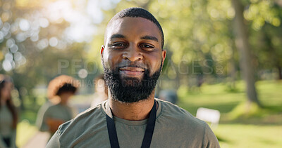 Buy stock photo Black man, portrait and charity in park for donation, volunteer and community service work with smile. African person, happy and eco friendly outdoor for change, project and sustainability with NGO