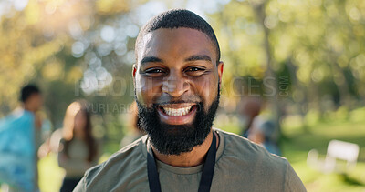 Buy stock photo Black man, portrait and smile in park for charity, volunteer and community service work with donation. African person, happy and eco friendly outdoor for change, project and sustainability with NGO