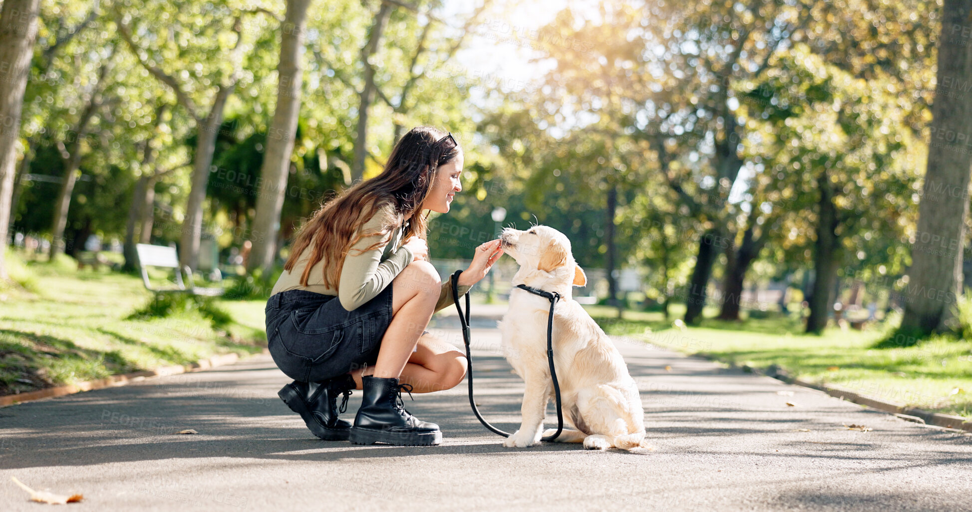 Buy stock photo Happy woman, dog and park with friendship, bonding and wellness, travel and journey on island. Female person, cheerful and pet care for walk, fresh air in outdoor on path in nature for training
