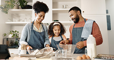 Family, child and baking in kitchen or home, cooking and learning together with parents in apartment or culinary. Food, treat and girl preparation and motor skills, love and childhood development