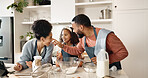 Family, child and baking or playful in kitchen, cooking and learning together with parents in apartment or culinary. Food, treat and girl preparation or fun in home, utensils and ingredients