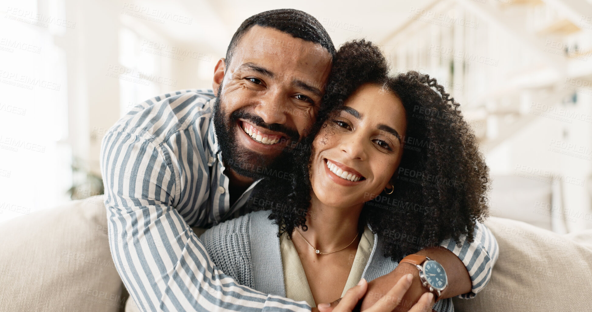 Buy stock photo Couple, portrait and hug with love on couch for date night or weekend break, romance and happy with embrace or commitment. Man, woman and bonding on sofa in new apartment or home, affection and care.