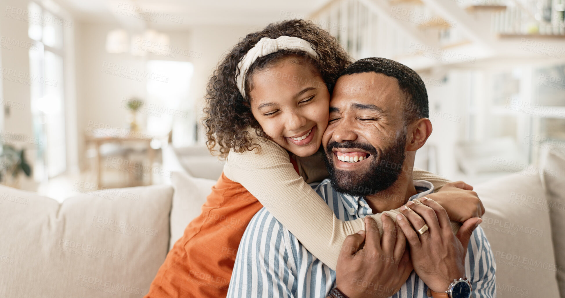 Buy stock photo Father, child and happy hug in home or morning bonding in apartment for trust, love or connection. Man, daughter and embrace on living room sofa for safety comfort or parent cuddle, family or smile