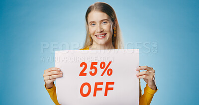 Buy stock photo Poster, sale and portrait of happy woman on blue background for news, announcement and information. Shopping, advertising and person with banner or sign for price discount, deal and bargain in studio