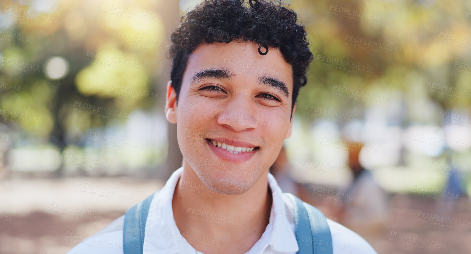 Buy stock photo Man, campus and student portrait with commute and smile at university ready for learning, education and class. Study, academy and post graduate candidate at college with backpack outdoor in park