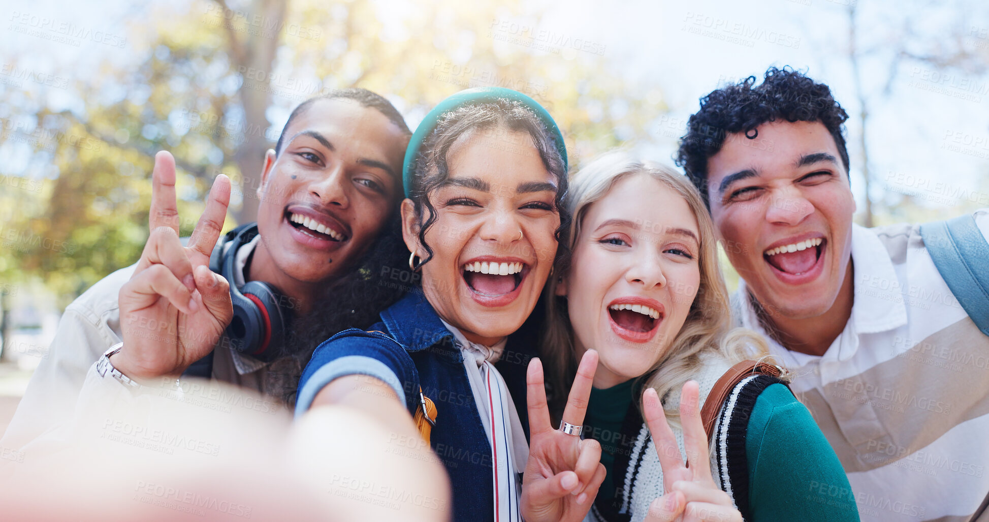 Buy stock photo Young students, portrait and peace sign with selfie in nature for memory, photography or review at outdoor park. Group of people or friends with smile for picture or fun moment together at campus