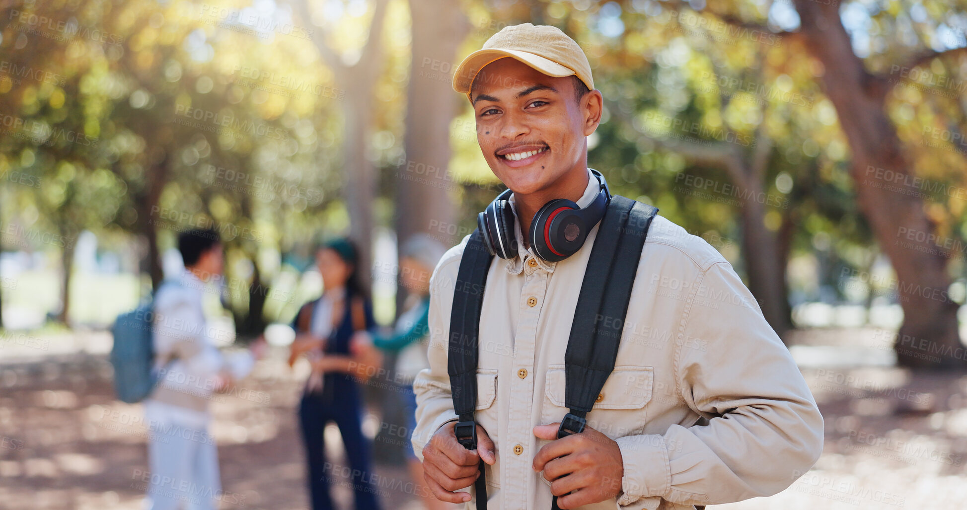 Buy stock photo Travel, man and university park portrait on campus in New York with backpack and study break. Happy, smile and education with a graduate student with confidence and commute outdoor at college