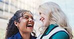 Happy, woman and friends laughing outside in city together, bonding and relationship with diversity people downtown. Smile, support and funny female person and joke conversation, gossip and travel
